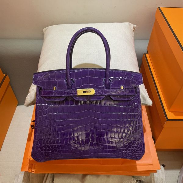 25cm women totes real shinny crocodile skin designers handbag brand purse luxury bag purple color fully handmade wax line stitching
25cm women totes real shinny crocodile skin designers handbag brand purse luxury bag purple color fully handmade wax line stitching