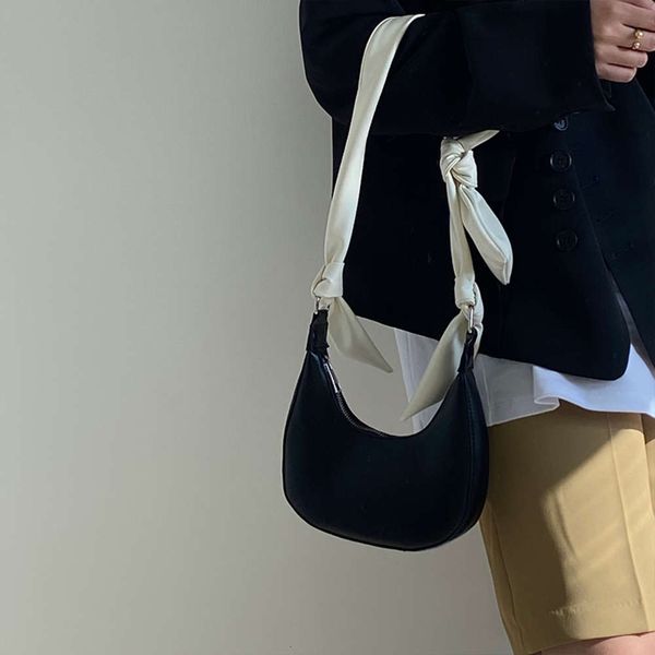 simple solid color female bowknot strap shoulder underarm bags fashion dign ladi portable handle women phone pouch
simple solid color female bowknot strap shoulder underarm bags fashion dign ladi portable handle women phone pouch