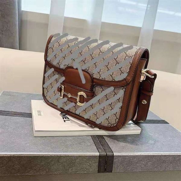 design handbag new women's bag old flower mini saddle title buckle single shoulder diagonal cross armpit contrast color messenger
design handbag new women's bag old flower mini saddle title buckle single shoulder diagonal cross armpit contrast color messenger