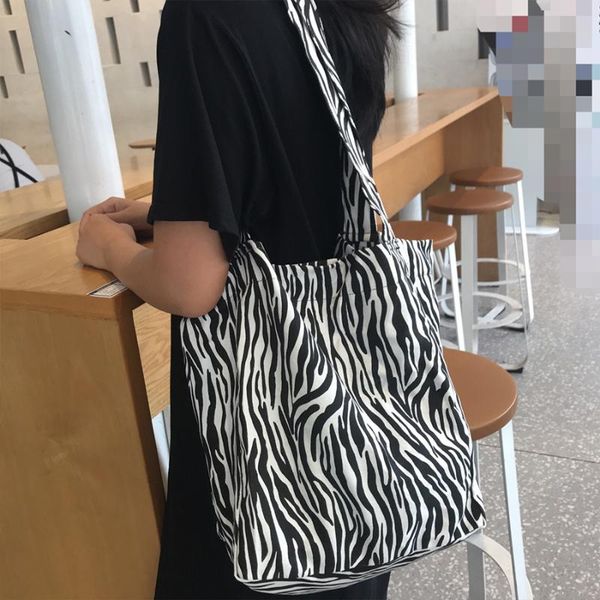 evening bags vintage zebra pattern canvas women shoulder casual large capacity tote handbags autumn travel female underarm shopping bag
evening bags vintage zebra pattern canvas women shoulder casual large capacity tote handbags autumn travel female underarm shopping bag