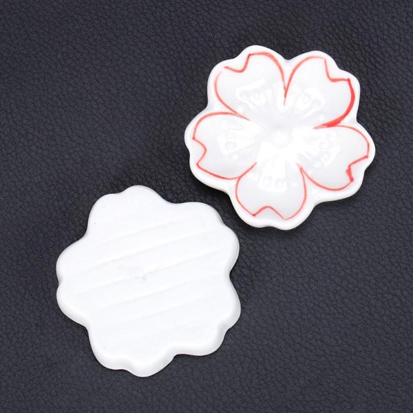 5pcs ceramic chopsticks rest japanese style sakura stand flower design rack holder (white)
5pcs ceramic chopsticks rest japanese style sakura stand flower design rack holder (white)