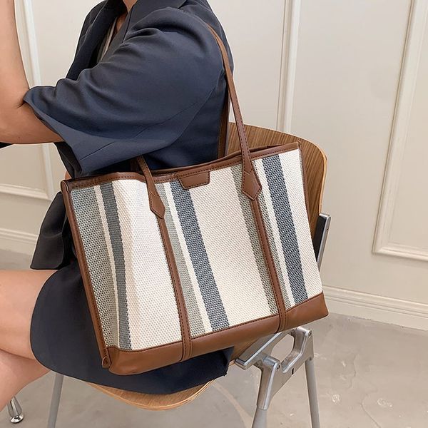 luxury handbags ins large capacity underarm women's 2021 new canvas striped tote bag fashion portable shoulder bag
luxury handbags ins large capacity underarm women's 2021 new canvas striped tote bag fashion portable shoulder bag