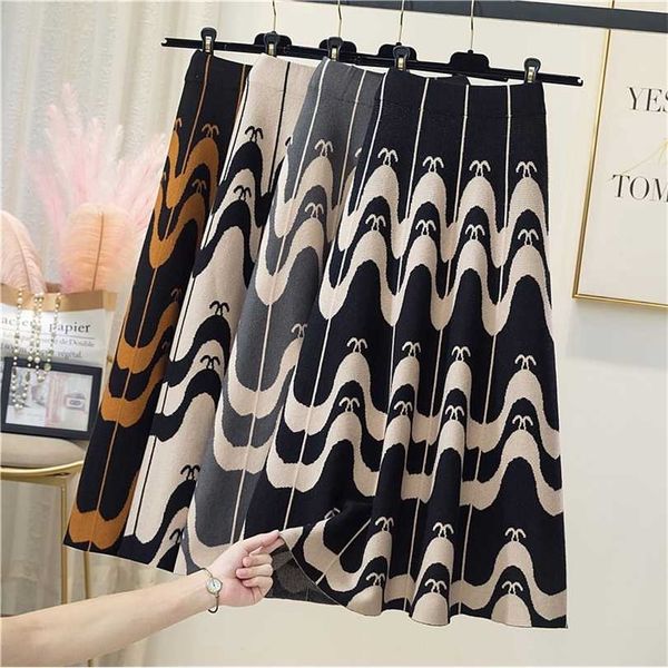 knitted skirt female autumn winter high waist umbrella ladies casual vintage printing loose thick warm s for women 211124, Black
knitted skirt female autumn winter high waist umbrella ladies casual vintage printing loose thick warm s for women 211124, Black