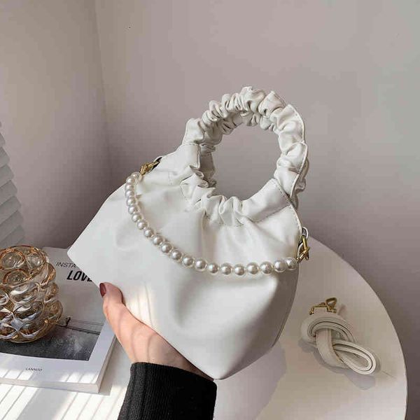 2021 summer women's portable diagonal large capacity dual-purpose fashion korean pearl candy korean princess diana bag
2021 summer women's portable diagonal large capacity dual-purpose fashion korean pearl candy korean princess diana bag