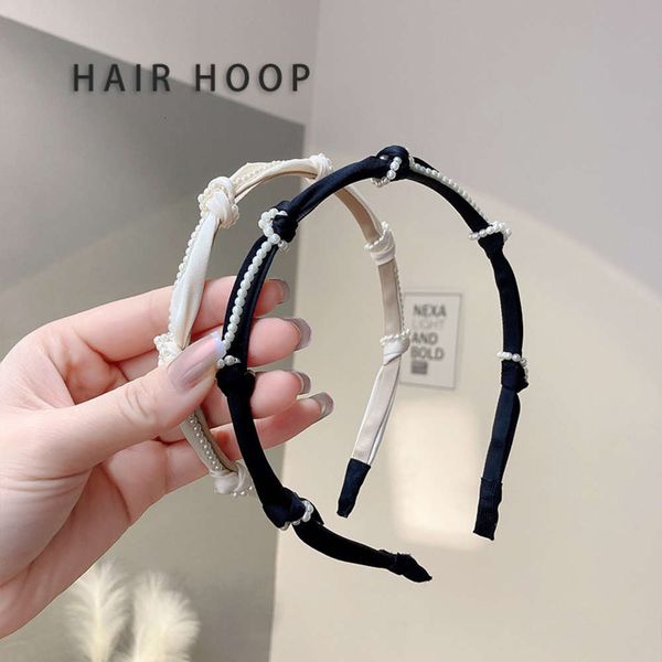 creative temperament girl headband pearl version sweet simple hairpin headdress, Black;brown
creative temperament girl headband pearl version sweet simple hairpin headdress, Black;brown