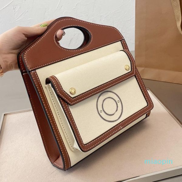 classic designers message bag totes man women handbags shoulder bags fashion canvas waterproof postman bag with high quality
classic designers message bag totes man women handbags shoulder bags fashion canvas waterproof postman bag with high quality