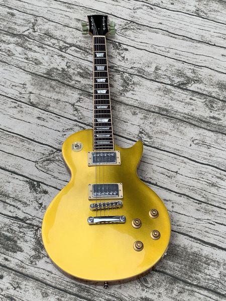 custom gold electric guitar, chrome hardware 
custom gold electric guitar, chrome hardware