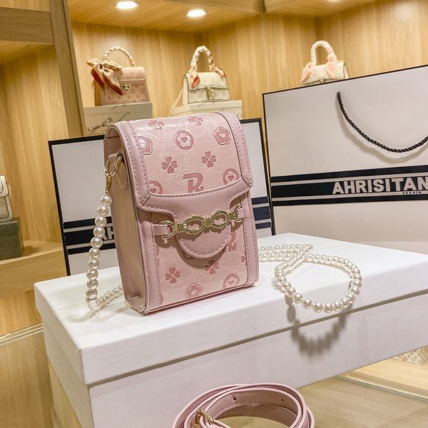 luxury design handbag 2021 new fashion net red embossed mini mobile phone single shoulder cross pearl chain small square box bag 
luxury design handbag 2021 new fashion net red embossed mini mobile phone single shoulder cross pearl chain small square box bag