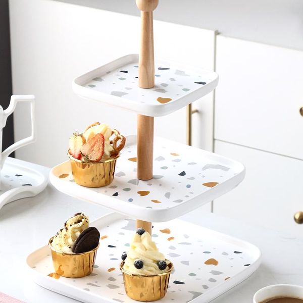 ceramic double three layer cake rack, snack, sugar water fruit tray, creative living room, afternoon tea storage bottles & jars
ceramic double three layer cake rack, snack, sugar water fruit tray, creative living room, afternoon tea storage bottles & jars