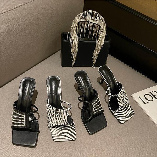 slippers european and american rhinestone tassel chain sandals women's 2021 summer stiletto middle heel high slipper, Black
slippers european and american rhinestone tassel chain sandals women's 2021 summer stiletto middle heel high slipper, Black