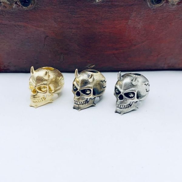 Â devil's skull knife bead umbrella rope car keychain pendant paracord beads personality hang brass outdoor gadgets
 devil's skull knife bead umbrella rope car keychain pendant paracord beads personality hang brass outdoor gadgets
