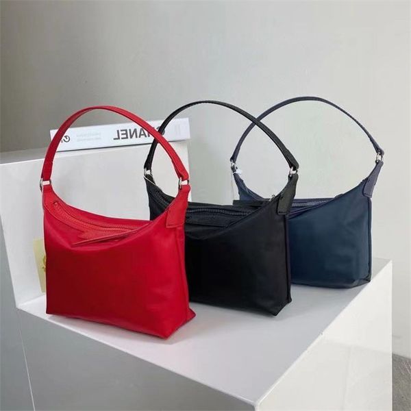 2021 new longxiang bag lc same solid color fashion simple oxford cloth bill of lading shoulder messenger armpit small square
2021 new longxiang bag lc same solid color fashion simple oxford cloth bill of lading shoulder messenger armpit small square