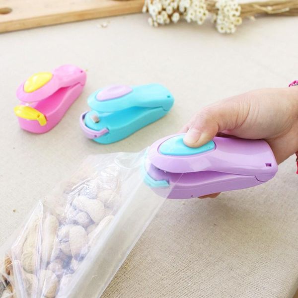 portable mini candy colored plastic bag sealing machine travel hand pressure heat clips
portable mini candy colored plastic bag sealing machine travel hand pressure heat clips
