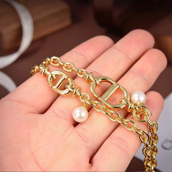 d gold double layer women's new 21 year branded net red signature pearl bracelet, White
d gold double layer women's new 21 year branded net red signature pearl bracelet, White