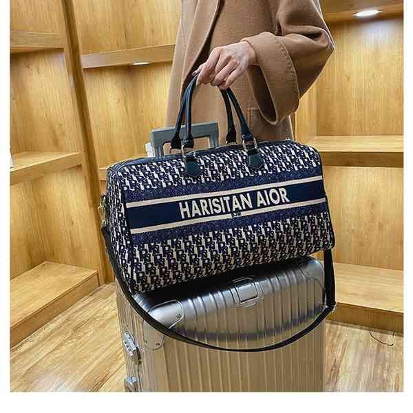 purse travel female printing hand-held messenger single shoulder large capacity short distance travel luggage bag
purse travel female printing hand-held messenger single shoulder large capacity short distance travel luggage bag