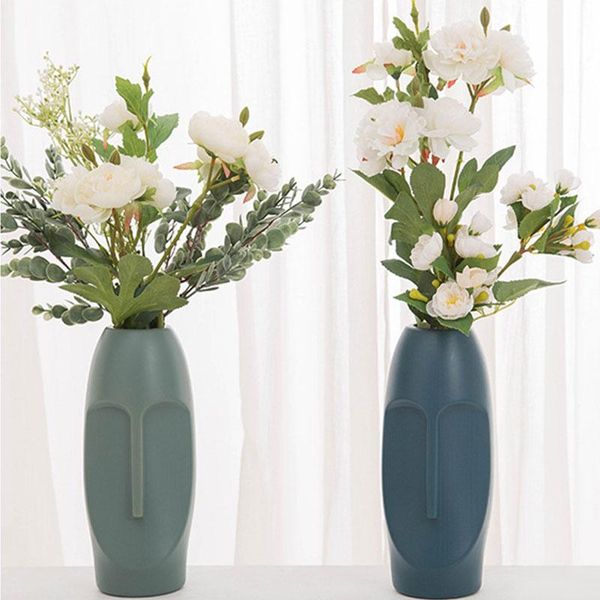 facing abstract vase decoration home plastic imitation ceramic flower pot nordic style basket vases
facing abstract vase decoration home plastic imitation ceramic flower pot nordic style basket vases