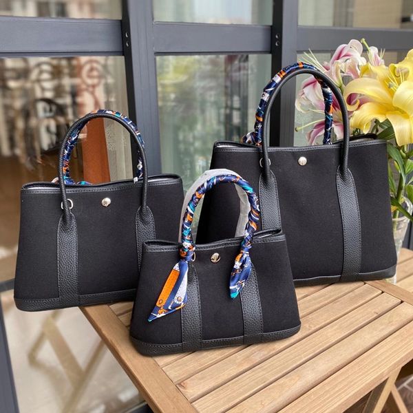 cowhide canvas garden single shoulder messenger portable business commuting leisure versatile large capacity tote bag women's fashion
cowhide canvas garden single shoulder messenger portable business commuting leisure versatile large capacity tote bag women's fashion
