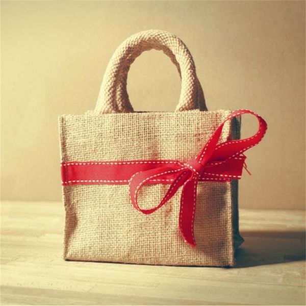 storage bags 100pcs/lot durable burlap tote jute bag with ribbon bow recycled natural fashion style grocery beach customizedlogo
storage bags 100pcs/lot durable burlap tote jute bag with ribbon bow recycled natural fashion style grocery beach customizedlogo