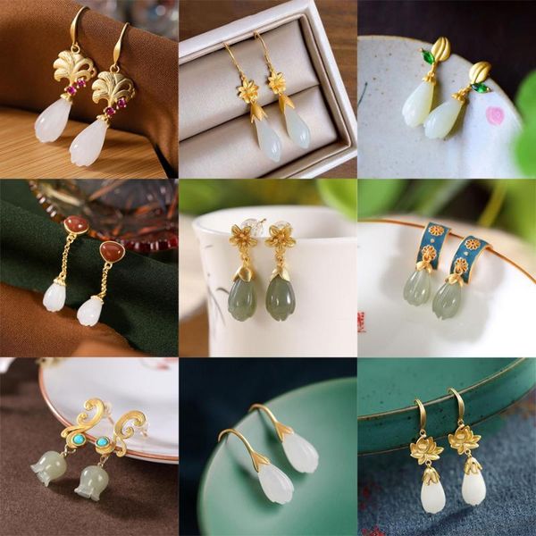 designer original natural hetian jade magnolia plant exquisite earrings chinese style elegant ladies silver jewelry dangle & chandelier
designer original natural hetian jade magnolia plant exquisite earrings chinese style elegant ladies silver jewelry dangle & chandelier