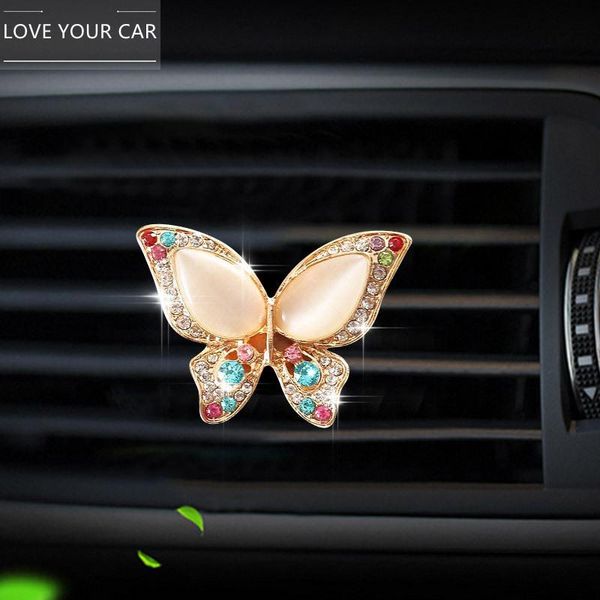 diamond-studded butterfly car air outlet perfume clip creative cute cat eye solid freshener
diamond-studded butterfly car air outlet perfume clip creative cute cat eye solid freshener