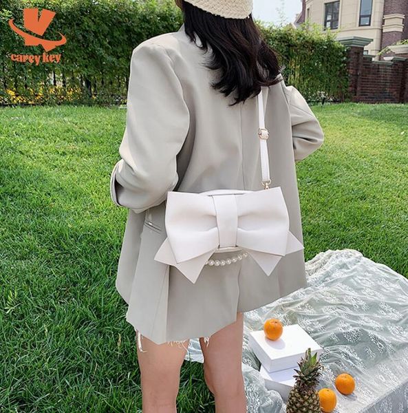 evening bags carey key big bow pearl tote bag 2021 fashion pu leather women designer handbag elegant female shoulder crossbody
evening bags carey key big bow pearl tote bag 2021 fashion pu leather women designer handbag elegant female shoulder crossbody