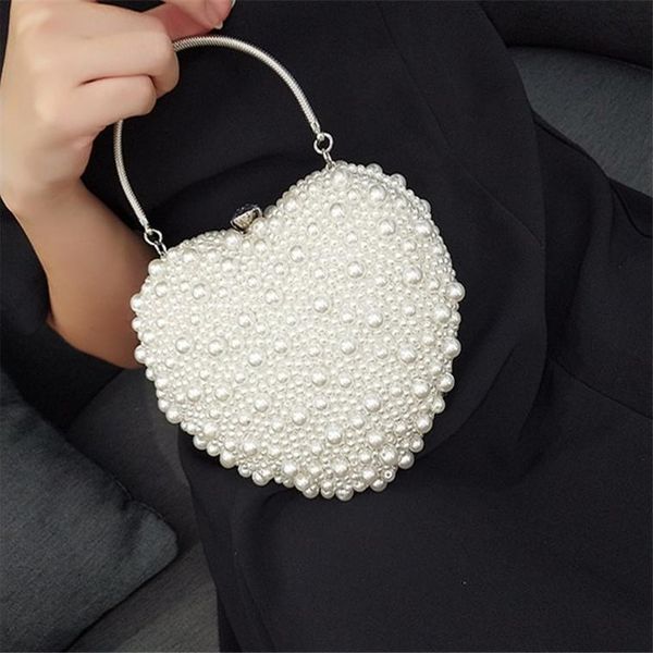 evening bags women bag creative handmade heart pearl lock weaving retro packet bridal over shoulder designer handbag
evening bags women bag creative handmade heart pearl lock weaving retro packet bridal over shoulder designer handbag