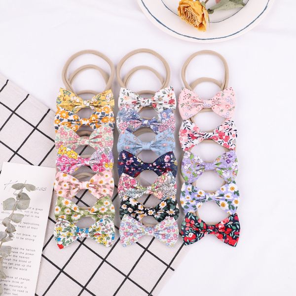 new 2.8inch bows nylon baby headband,floral prints hair bow nylon turban headband or hair clips for girls hair accessories, Slivery;white
new 2.8inch bows nylon baby headband,floral prints hair bow nylon turban headband or hair clips for girls hair accessories, Slivery;white