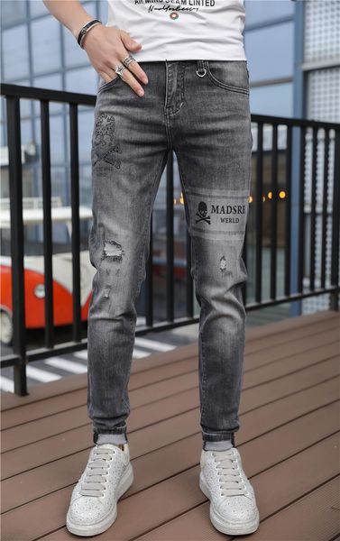 men's summer 2021 personality logo skulls drill trend slim fit versatile torn small foot jeans, Blue
men's summer 2021 personality logo skulls drill trend slim fit versatile torn small foot jeans, Blue