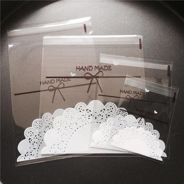 gift wrap 100pcs/lot transparent bow lace plastic self adhesive cookie packaging bag wedding candy decoration bags
gift wrap 100pcs/lot transparent bow lace plastic self adhesive cookie packaging bag wedding candy decoration bags