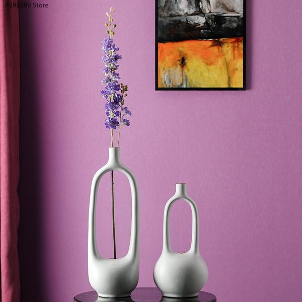 vases ceramic vase living room deskdried flower arrangement jewelry crafts ornaments modern home decoration accessories 
vases ceramic vase living room deskdried flower arrangement jewelry crafts ornaments modern home decoration accessories