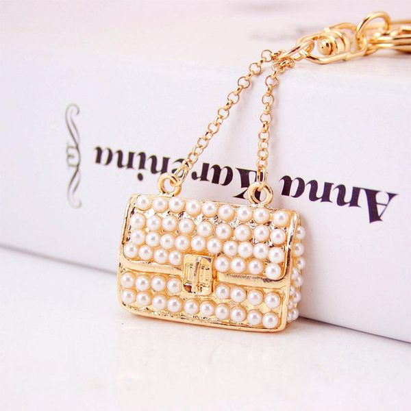 keychains fashionable cute woman bag shape keychain commemorative gift inlaid pearl chain key ring car pendant, Silver
keychains fashionable cute woman bag shape keychain commemorative gift inlaid pearl chain key ring car pendant, Silver