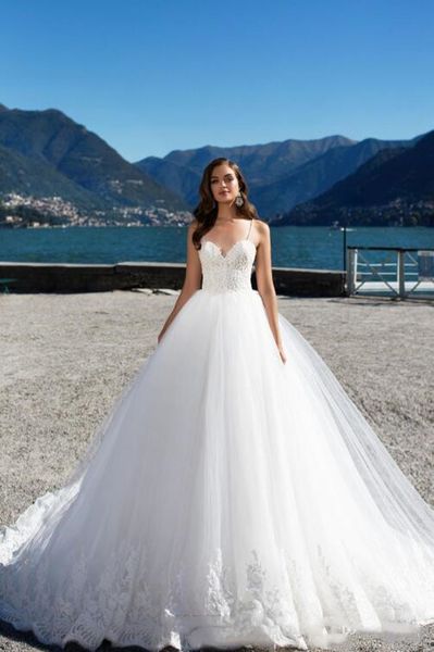 elegant white lace wedding gowns spaghetti straps backless soft tulle summer beach bohemian bridal dresses
elegant white lace wedding gowns spaghetti straps backless soft tulle summer beach bohemian bridal dresses