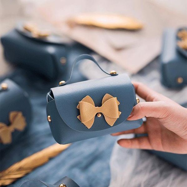 10pcs mini pu leather bag shaped gift box candy bags souvenir packaging baby shower wedding party favors wrap
10pcs mini pu leather bag shaped gift box candy bags souvenir packaging baby shower wedding party favors wrap