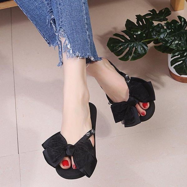 slippers simple cool female summer fashion wear korean version of slope heel thick beach clip flip-flops, Black
slippers simple cool female summer fashion wear korean version of slope heel thick beach clip flip-flops, Black