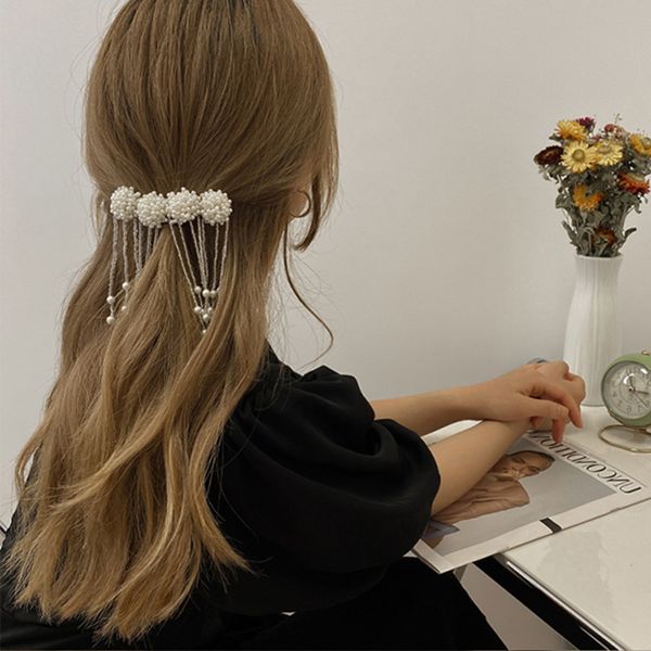 pearl tassel hair clip women's headdress fairy net red temperament advanced feeling, Golden;silver
pearl tassel hair clip women's headdress fairy net red temperament advanced feeling, Golden;silver