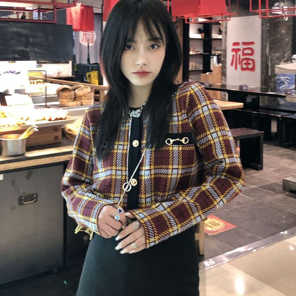 autumn and winter style long sleeve knitted sweater cardigan small fragrance short coat top, Black;brown
autumn and winter style long sleeve knitted sweater cardigan small fragrance short coat top, Black;brown
