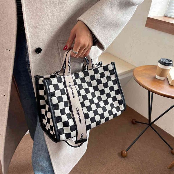 2022 factory wholesale fashion chessboard getuote bag korean version style atmospheric simple handbag trend wide shoulder strap single shoul 
2022 factory wholesale fashion chessboard getuote bag korean version style atmospheric simple handbag trend wide shoulder strap single shoul