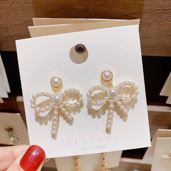 korean super fairy bow pearl earrings 2021 temperament versatile female exaggerated high sense, Golden
korean super fairy bow pearl earrings 2021 temperament versatile female exaggerated high sense, Golden