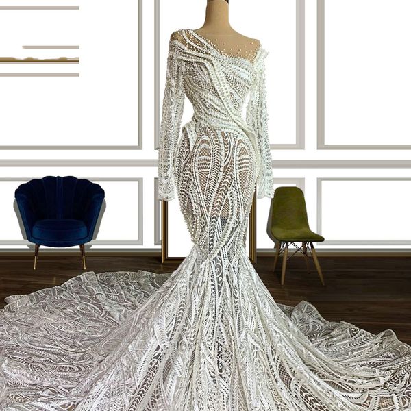gorgeous mermaid pearls wedding dresses bridal gowns jewel neck lace appliqued long sleeve african robes de mariée, White
gorgeous mermaid pearls wedding dresses bridal gowns jewel neck lace appliqued long sleeve african robes de mariée, White