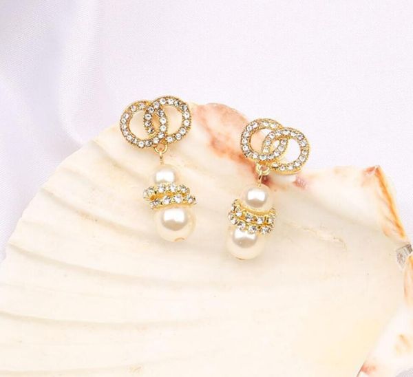 geometric pearl crystal rhinestone pendant stud earrings luxury brand designer letter 18k gold plated earring fashion wedding party jewerlry, Golden;silver
geometric pearl crystal rhinestone pendant stud earrings luxury brand designer letter 18k gold plated earring fashion wedding party jewerlry, Golden;silver