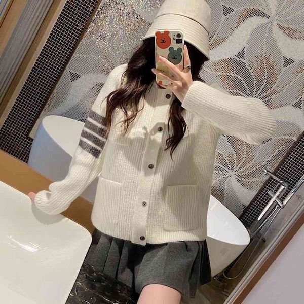 2021 autumn winter new fashion brand tb wool knitted cardigan sweater jacket four bar pocket lapel casual coat, White;black
2021 autumn winter new fashion brand tb wool knitted cardigan sweater jacket four bar pocket lapel casual coat, White;black
