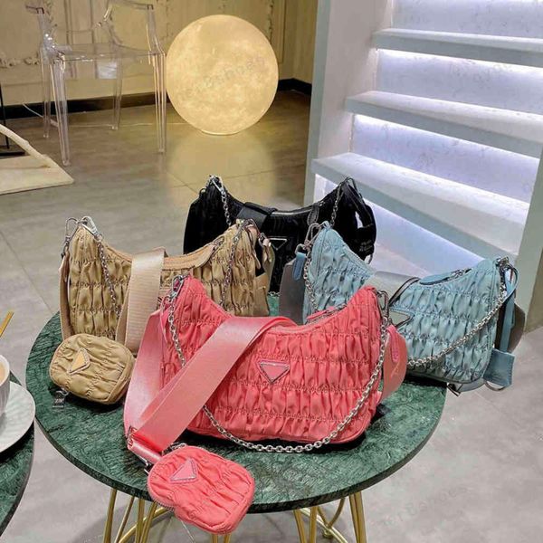 gift box packaging fold style nylon embroidery shoulder strap three-in-one underarm bag size 22*16cm
gift box packaging fold style nylon embroidery shoulder strap three-in-one underarm bag size 22*16cm