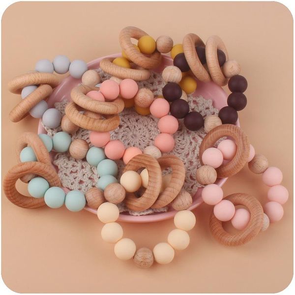 baby teethers toys wristband natural wooden silicone teething beads teether newborn teeth practice food grade soother infant feeding kid che
baby teethers toys wristband natural wooden silicone teething beads teether newborn teeth practice food grade soother infant feeding kid che