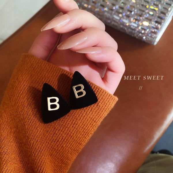 triangular black flannel letter earrings for women simple, earrings temperament fashion
triangular black flannel letter earrings for women simple, earrings temperament fashion