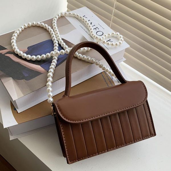 evening bags beaded pearl chain mini pu leather handbags for women 2021 ladies fashion simple shoulder armpit crossbody
evening bags beaded pearl chain mini pu leather handbags for women 2021 ladies fashion simple shoulder armpit crossbody