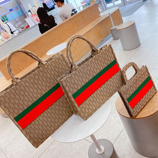 large capacity portable bag women's new fashion net red fashion contrast color women's bags autumn and winter simple texture tote
large capacity portable bag women's new fashion net red fashion contrast color women's bags autumn and winter simple texture tote