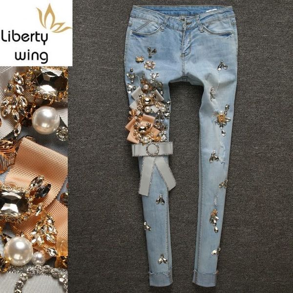 women's jeans european luxury diamond rhinestone women ripped tassel denim trousers light blue stretch pencil pants plus size 25-30
women's jeans european luxury diamond rhinestone women ripped tassel denim trousers light blue stretch pencil pants plus size 25-30