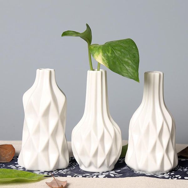 ceramic creative fashion white vase modern simple porcelain living room decoration home dried flower vases
ceramic creative fashion white vase modern simple porcelain living room decoration home dried flower vases