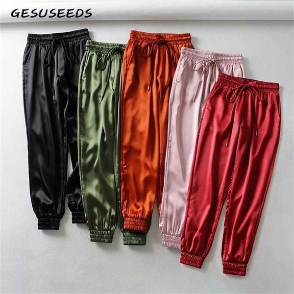 autumn black satin joggers women trousers high waist pants pink sweat green sweat winter 211115, Black;white
autumn black satin joggers women trousers high waist pants pink sweat green sweat winter 211115, Black;white
