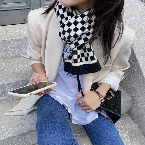 korean autumn and winter knitted girls' checkerboard lattice with net red long warm wearing scarf, Blue;gray
korean autumn and winter knitted girls' checkerboard lattice with net red long warm wearing scarf, Blue;gray